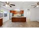 Spacious kitchen with island, stainless steel appliances, and granite countertops at 8344 E Indianola Ave, Scottsdale, AZ 85251