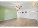 Spacious living room with tile floors and ceiling fan at 8344 E Indianola Ave, Scottsdale, AZ 85251