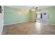 Living room with tile floors, sliding doors and a ceiling fan at 8344 E Indianola Ave, Scottsdale, AZ 85251