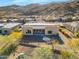 Expansive Southwestern home with neutral stucco, mountains, desert landscaping, and fenced yard at 8606 S 30Th St, Phoenix, AZ 85042