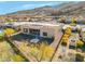 Aerial view of the home's backyard with desert landscaping and mountain views at 8606 S 30Th St, Phoenix, AZ 85042