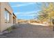 Low maintenance backyard, showcasing the natural desert landscape, with privacy and space at 8606 S 30Th St, Phoenix, AZ 85042