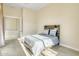 Inviting bedroom featuring neutral walls and a statement headboard at 8606 S 30Th St, Phoenix, AZ 85042