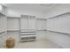 Large walk-in closet with ample shelving and storage spaces at 8606 S 30Th St, Phoenix, AZ 85042