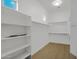 Bright walk-in closet with multiple rows of shelving at 8606 S 30Th St, Phoenix, AZ 85042