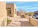 A beautiful brick front patio featuring native plants and desert landscaping at 8606 S 30Th St, Phoenix, AZ 85042