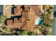 Aerial view of a beautiful home with a tile roof and private pool at 8923 E Mountain Spring Rd, Scottsdale, AZ 85255