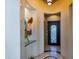 Hallway with decorative niche and custom iron door at 8923 E Mountain Spring Rd, Scottsdale, AZ 85255