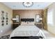 Tasteful main bedroom with a patterned accent wall, elegant lighting fixtures, and designer furnishings at 8923 E Mountain Spring Rd, Scottsdale, AZ 85255