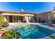 Inviting backyard pool area with comfortable lounge seating and lush greenery at 8923 E Mountain Spring Rd, Scottsdale, AZ 85255