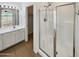 Clean bathroom with a walk-in shower and updated vanity at 9023 W Hubbell St, Phoenix, AZ 85037