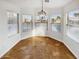 Breakfast nook with large windows and a chandelier at 9023 W Hubbell St, Phoenix, AZ 85037