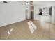 Bright living room with tile flooring and ceiling fan at 9023 W Hubbell St, Phoenix, AZ 85037