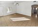 Living room with tile flooring, and a view of the front door at 9023 W Hubbell St, Phoenix, AZ 85037