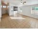 Spacious living room with tile flooring and ceiling fan at 9023 W Hubbell St, Phoenix, AZ 85037