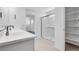 Bathroom featuring double sink vanity and walk-in shower at 9054 S 169Th Dr, Goodyear, AZ 85338