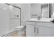 Bathroom featuring a modern shower, white vanity, and neutral color palette at 9054 S 169Th Dr, Goodyear, AZ 85338