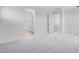 Bright bedroom with carpet flooring with attached bathroom at 9054 S 169Th Dr, Goodyear, AZ 85338