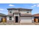 Charming two-story home with a two car garage and stone accents at 9054 S 169Th Dr, Goodyear, AZ 85338