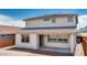 Rear exterior view of the home highlighting the covered patio and tile roof at 9054 S 169Th Dr, Goodyear, AZ 85338
