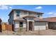 Exterior front view showcasing the two-story home and attached garage at 9054 S 169Th Dr, Goodyear, AZ 85338