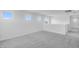 Spacious loft area with plush carpeting and bright, natural light at 9054 S 169Th Dr, Goodyear, AZ 85338