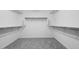 Spacious walk-in closet with shelving and hanging rods at 9054 S 169Th Dr, Goodyear, AZ 85338
