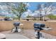 Community BBQ area with two grills for resident use at 9100 E Raintree Dr # 232, Scottsdale, AZ 85260