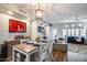 Open dining area with a rustic table and chairs at 9100 E Raintree Dr # 232, Scottsdale, AZ 85260