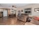 Dining area with wooden table and chairs near kitchen at 9333 E University Dr # 86, Mesa, AZ 85207