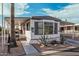 Front view of the manufactured home with carport and landscaping at 9333 E University Dr # 86, Mesa, AZ 85207