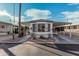 Front view of the manufactured home with carport and landscaping at 9333 E University Dr # 86, Mesa, AZ 85207