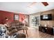 Living room with brown couches and sliding glass door at 9333 E University Dr # 86, Mesa, AZ 85207