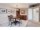 Cozy dining room featuring a round table, decorative chairs, and built in cabinet at 10401 N Saguaro Blvd # 118, Fountain Hills, AZ 85268