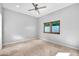 Spacious bedroom with neutral walls and tile flooring at 10410 N 74Th Pl, Scottsdale, AZ 85258