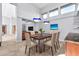 Formal dining room with a wooden table and pendant lighting at 10410 N 74Th Pl, Scottsdale, AZ 85258