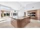 Gourmet kitchen featuring granite island and stainless steel appliances at 10410 N 74Th Pl, Scottsdale, AZ 85258