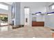 Spacious living room with a large fireplace and high ceilings at 10410 N 74Th Pl, Scottsdale, AZ 85258