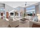 Sun-drenched living room with sliding doors to backyard oasis at 10410 N 74Th Pl, Scottsdale, AZ 85258