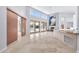Spacious living room with high ceilings, fireplace, and large windows at 10410 N 74Th Pl, Scottsdale, AZ 85258