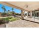 Covered patio overlooking the pool and fire pit at 10410 N 74Th Pl, Scottsdale, AZ 85258
