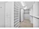 Spacious walk-in closet with ample shelving and hanging space at 10410 N 74Th Pl, Scottsdale, AZ 85258