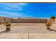 Backyard patio with brick pavers and ample space for outdoor furniture and entertaining at 10501 W Swayback Pass, Peoria, AZ 85383