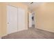 Neutral bedroom with closet at 10501 W Swayback Pass, Peoria, AZ 85383