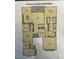 Detailed floor plan featuring a spacious layout with an open-concept kitchen and living area at 10501 W Swayback Pass, Peoria, AZ 85383