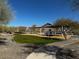 Outdoor playground area with swings, slides, and play structures for community enjoyment at 10501 W Swayback Pass, Peoria, AZ 85383