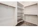 Walk-in closet with shelving and hanging rods, and carpet flooring at 10501 W Swayback Pass, Peoria, AZ 85383