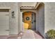 Inviting entryway with a yellow door and welcome decor at 1078 E Oriole Dr, Gilbert, AZ 85297