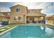 Large rectangular pool with patio and view of the house at 1078 E Oriole Dr, Gilbert, AZ 85297