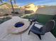 Fire pit and chairs in a landscaped backyard at 11340 E Stearn Ave, Mesa, AZ 85212